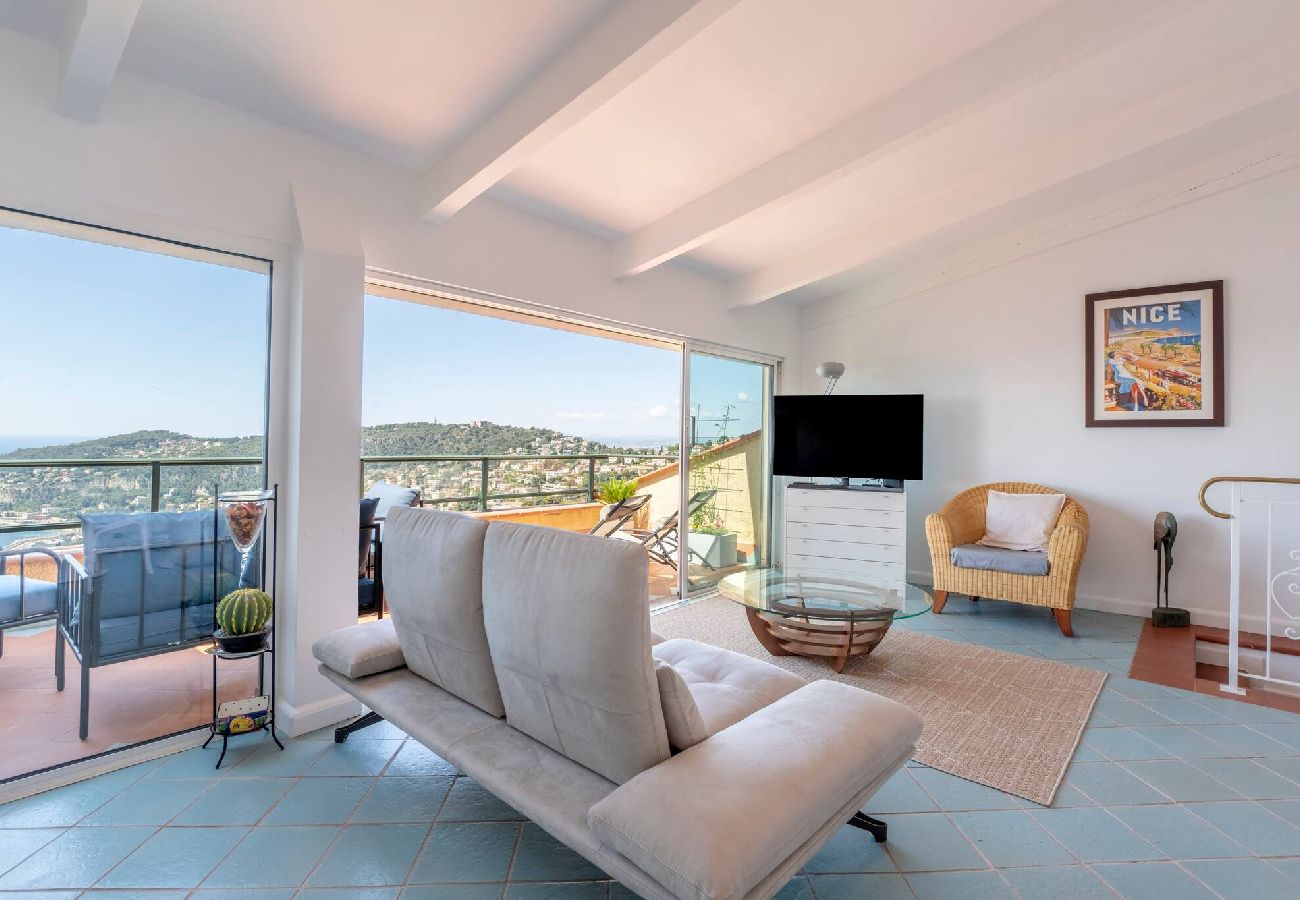 Large living room with sofa, coffee table, TV