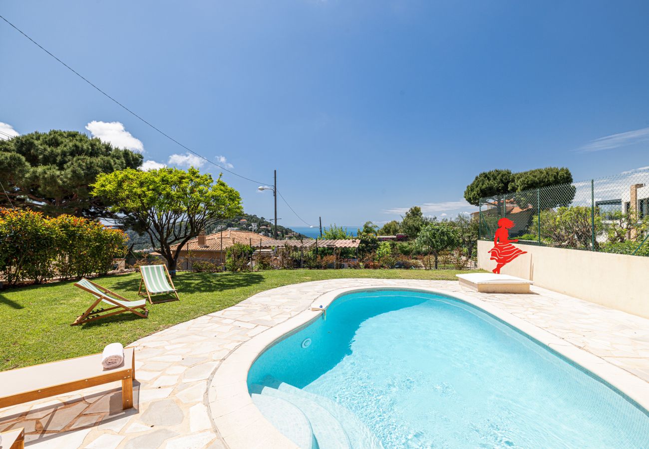 Large garden with swimming pool, sea view and outdoor furniture