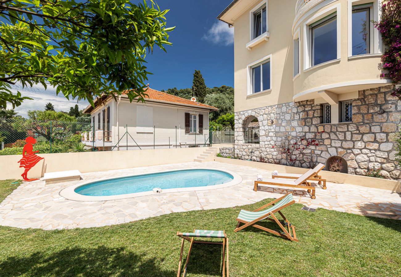 Garden with swimming pool and view of the Mediterranean Sea